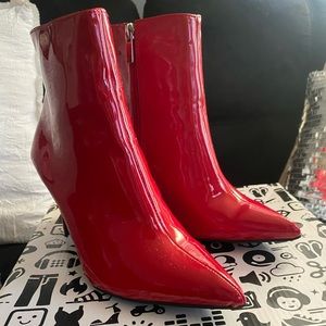 Red bootie heels with zipper